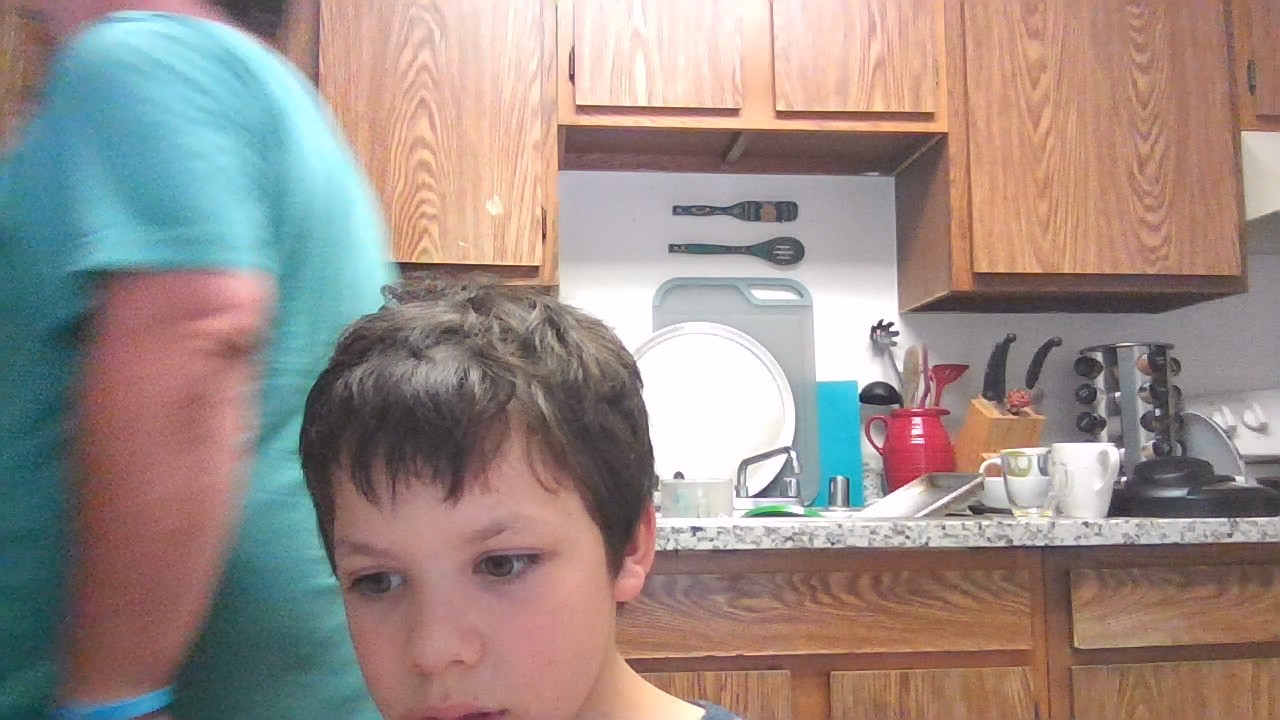 Aaron Incasa with William Incasa in the family kitchen